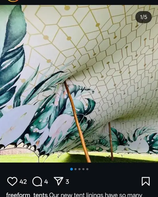 Instagram screenshot showing a stretch tent interior with a custom printed lining featuring gold geometric patterns and tropical leaves.